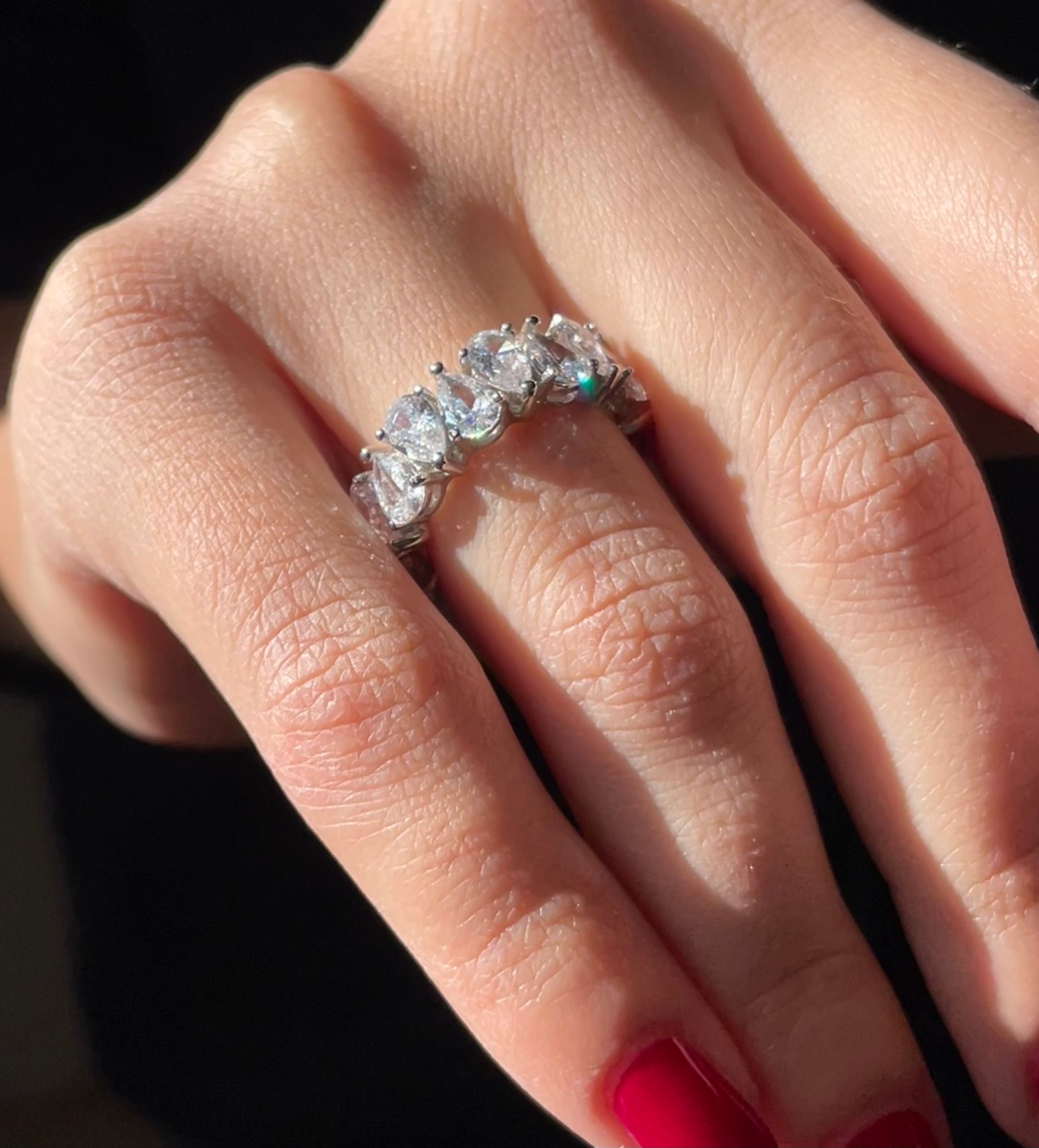 Eternity ring with drop-cut stones