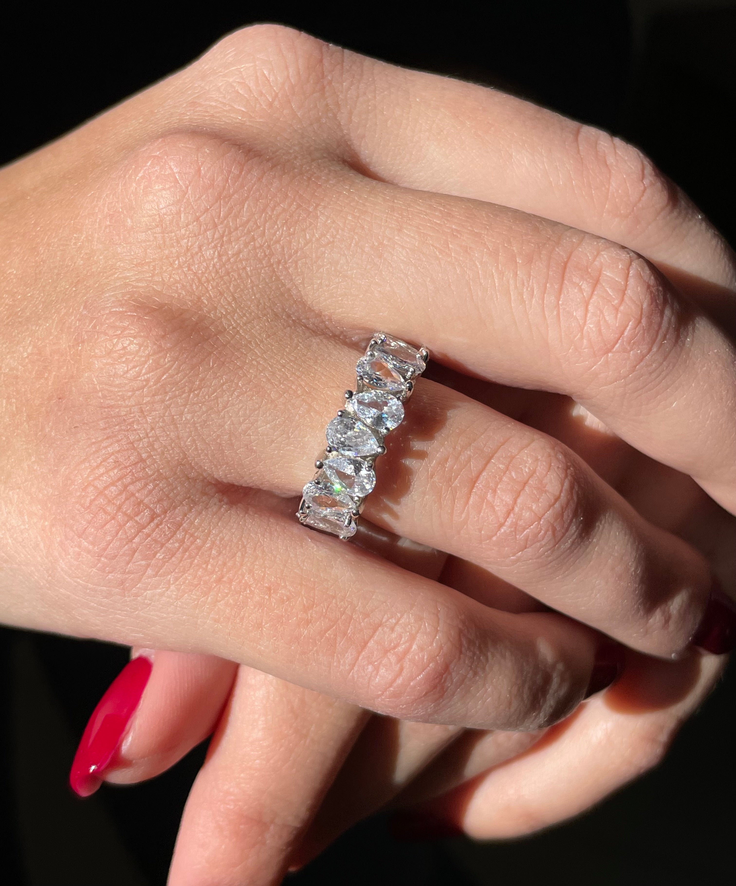 Eternity ring with drop-cut stones