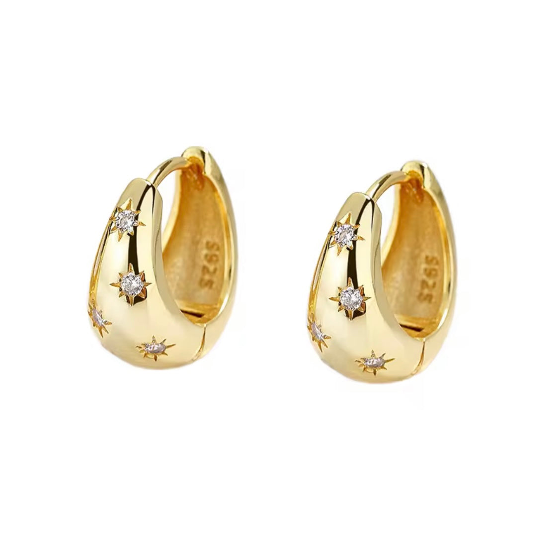 Orecchini con pietre con incastonatura a stella