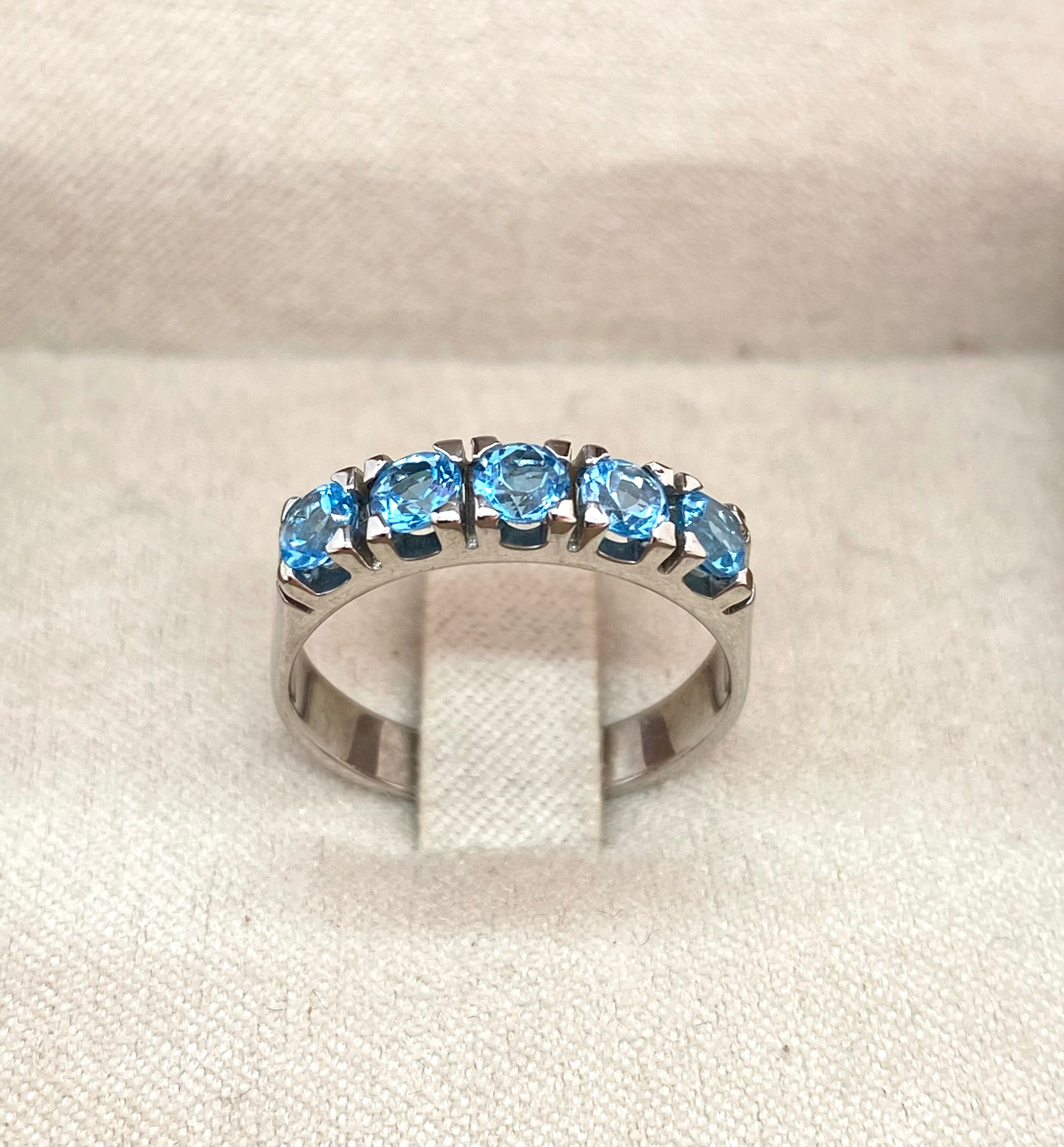 Riviera ring with topaz